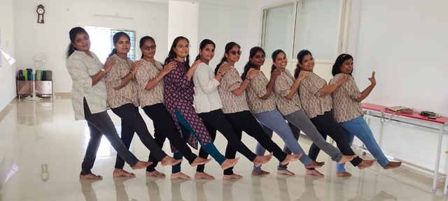 Members of the Happy Yogis community together at a centre event